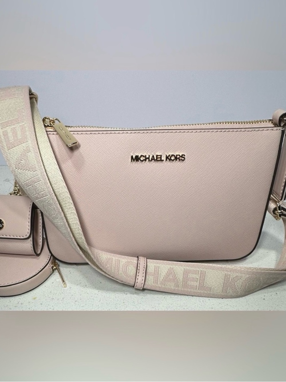 Michael Kors Jet Set small Saffiano leather crossbody bag w/earpod pro case.